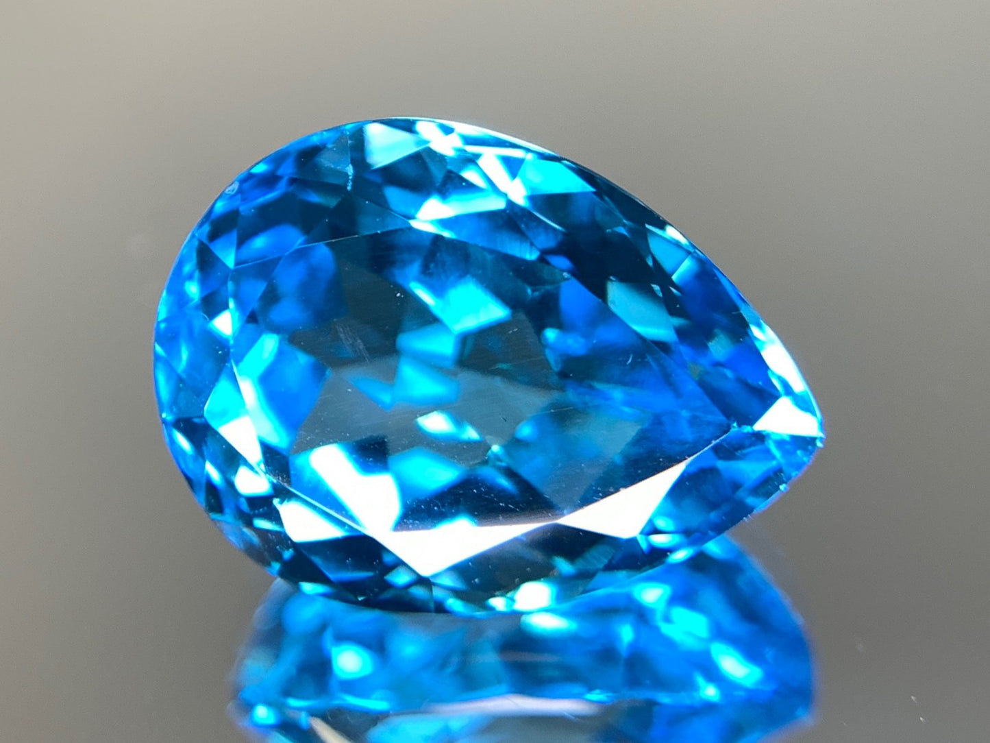 ブルートパーズ 天然 12.214ct 宝石ソーティング付き 16.1㎜×11.8㎜×8.5㎜ ルース（ 裸石 ） 6791Y