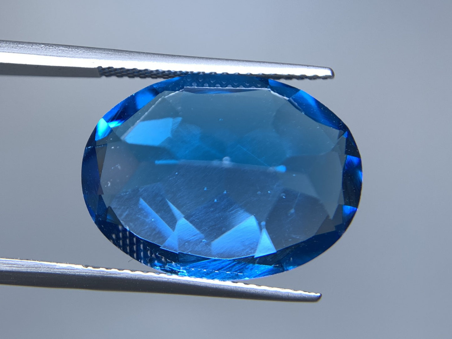 ブルートパーズ 天然 21.107ct 宝石ソーティング付き 20.0㎜×14.9㎜×10.0㎜ ルース（ 裸石 ） 6788Y