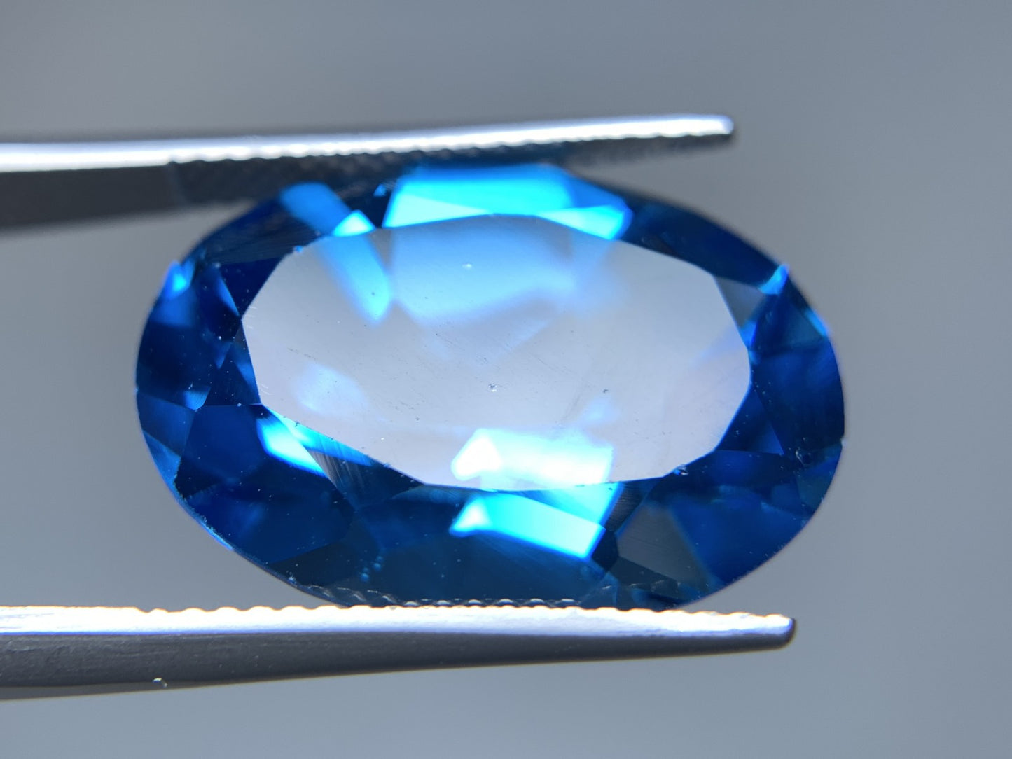 ブルートパーズ 天然 21.107ct 宝石ソーティング付き 20.0㎜×14.9㎜×10.0㎜ ルース（ 裸石 ） 6788Y