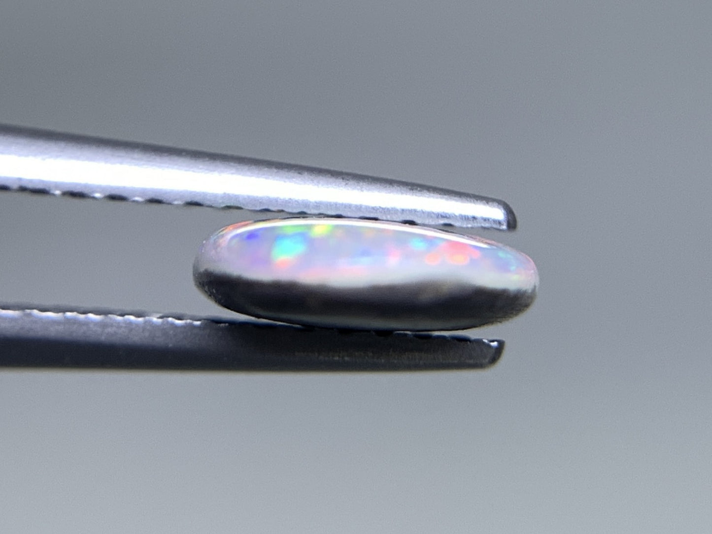 ブラックオパール 天然  1.458ct  中央宝石ソーティング付き  12.4㎜×7.6㎜×2.4㎜  ルース（ 裸石 ） 5802Y