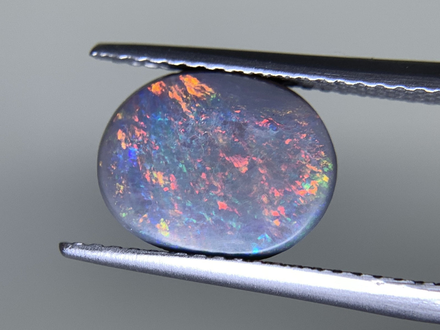 ブラックオパール  天然  1.654ct  中央宝石ソーティング付き  10.9㎜×8.6㎜×2.6㎜   天然 ルース（ 裸石 ） 5203Y