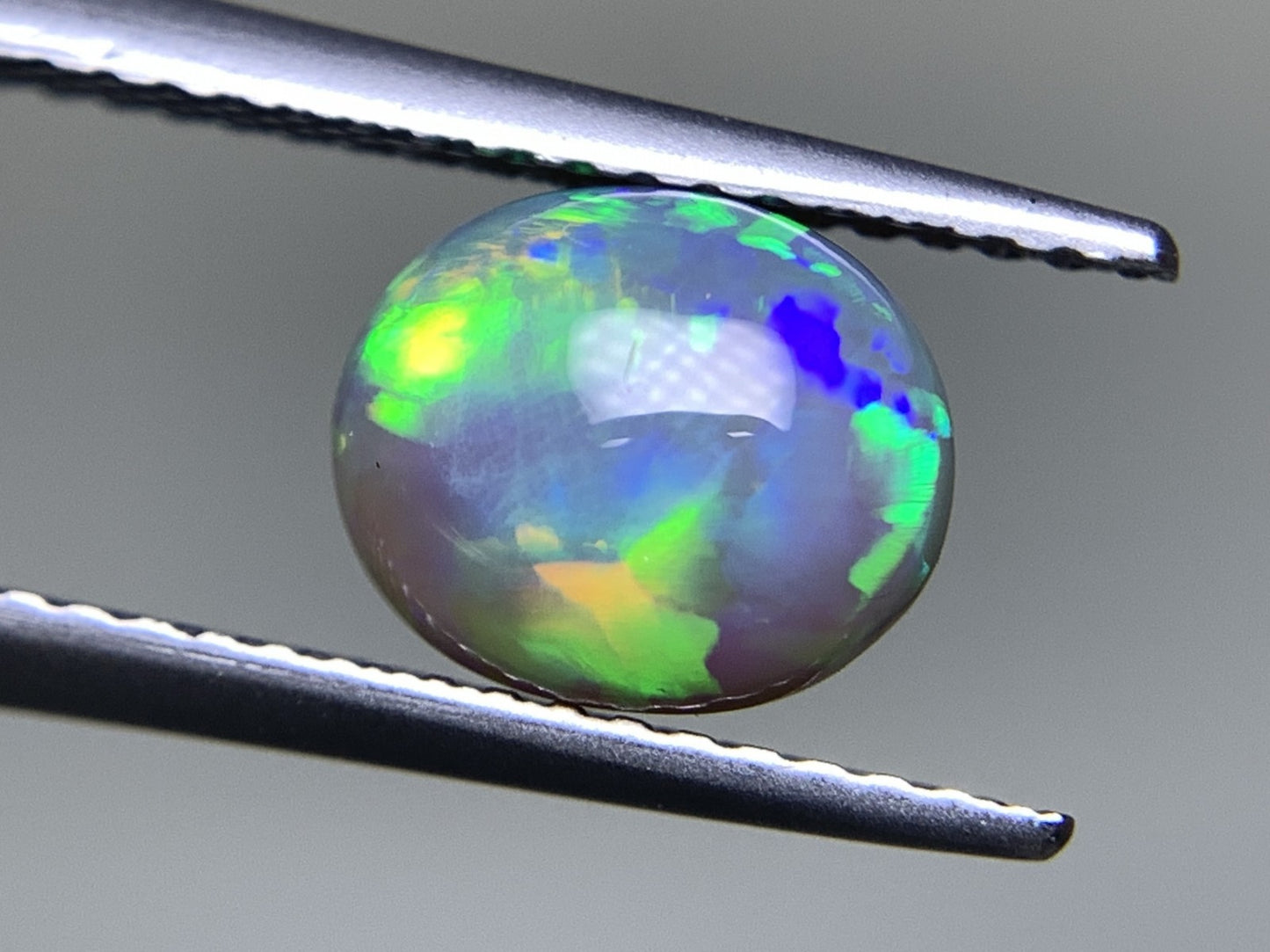 ブラックオパール 1.598ct 宝石ソーティング付き  7.9㎜×6.8㎜×4.6㎜  ルース（ 裸石 ） 2556Y