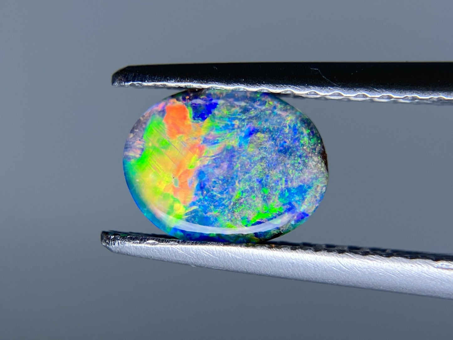 ボルダーオパール 0.636ct 宝石ソーティング付き 7.4㎜×5.8㎜×2.1㎜ ルース（ 裸石 ） 3191S