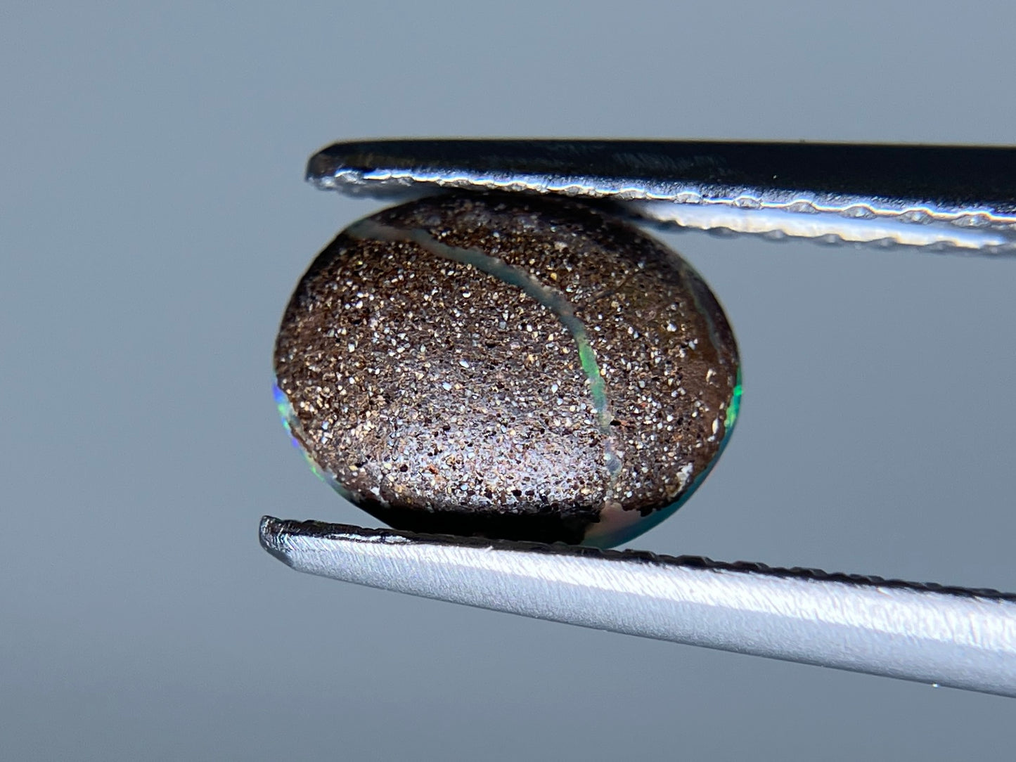 ボルダーオパール 0.636ct 宝石ソーティング付き 7.4㎜×5.8㎜×2.1㎜ ルース（ 裸石 ） 3191S