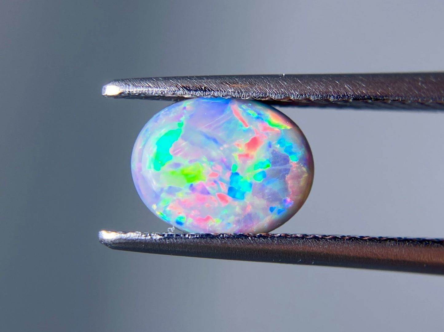 ブラックオパール 0.912ct 宝石ソーティング付き 8.1㎜×6.4㎜×2.6㎜ ルース（ 裸石 ） 3284S