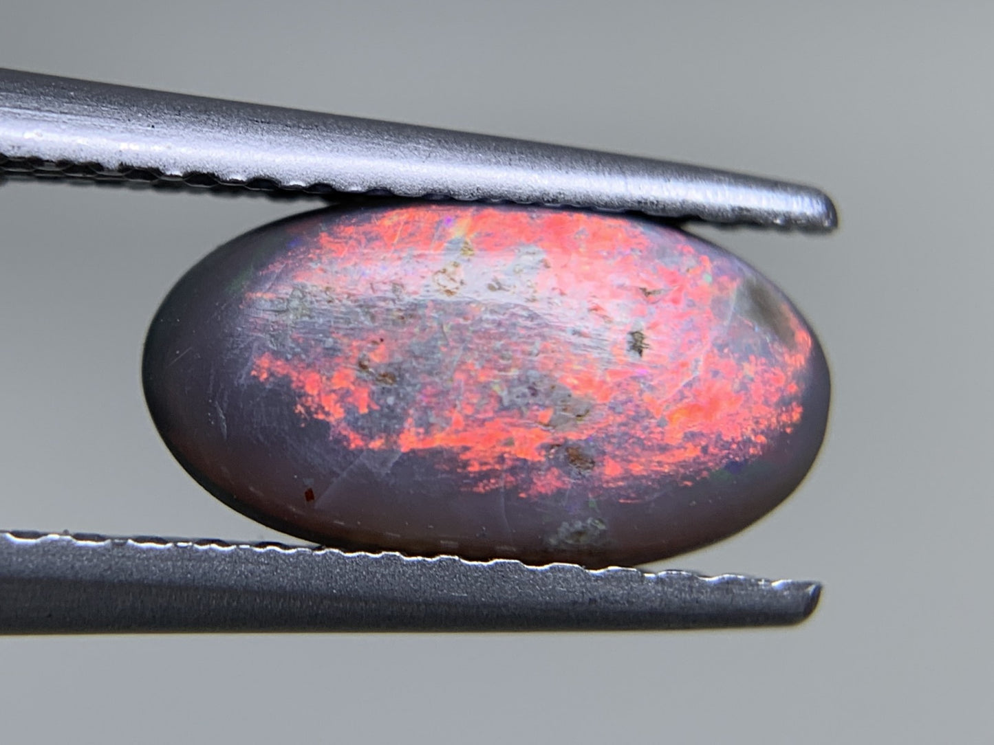 ブラックオパール（両面遊色） 天然  1.069ct  中央宝石ソーティング付き  10.3㎜×5.5㎜×2.9㎜  ルース（ 裸石 ） 6064Y