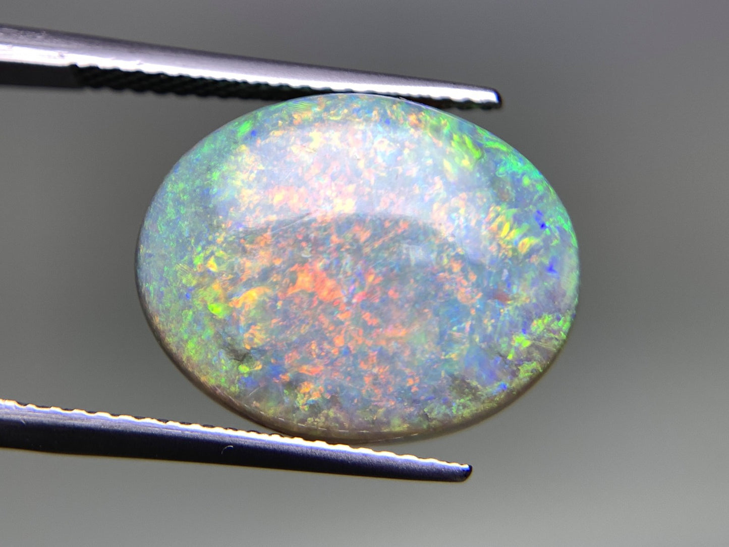 ブラックオパール 7.198ct 宝石ソーティング付き 17.4㎜×13.9㎜×4.5㎜ 天然 ルース（ 裸石 ） 4604Y