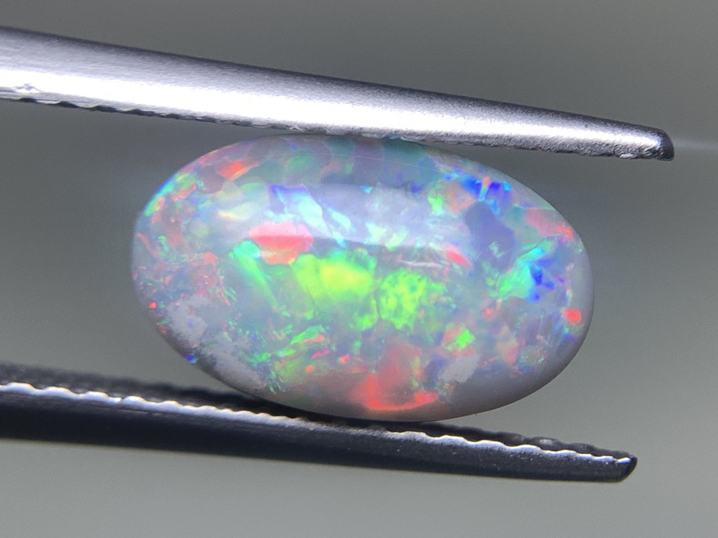 ブラックオパール 1.586ct 宝石ソーティング付き  10.4㎜×6.5㎜×3.9㎜  ルース（ 裸石 ） 3188Y