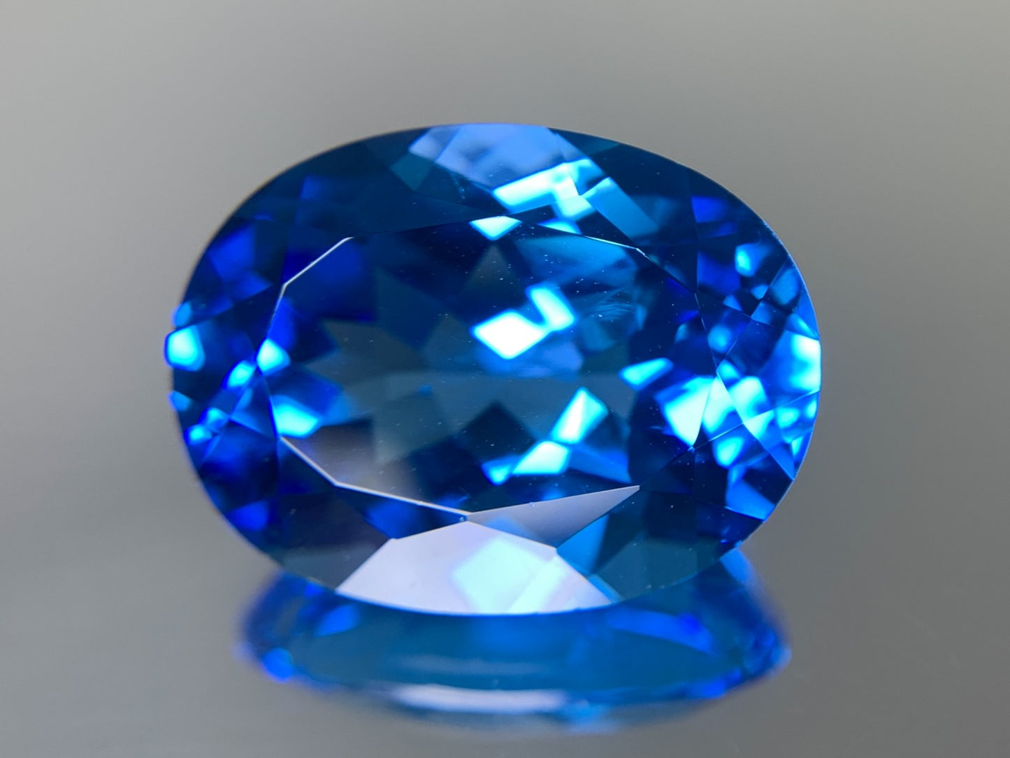 ブルートパーズ 天然 23.222ct 宝石ソーティング付き 20.0㎜×15.2㎜×10.0㎜ ルース（ 裸石 ） 6411Y