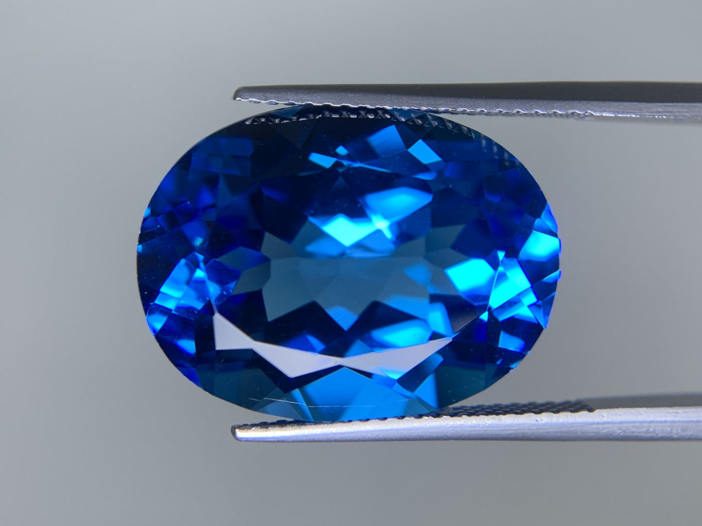 ブルートパーズ 天然 23.222ct 宝石ソーティング付き 20.0㎜×15.2㎜×10.0㎜ ルース（ 裸石 ） 6411Y