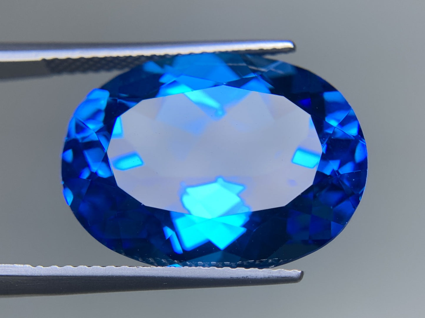 ブルートパーズ 天然 23.222ct 宝石ソーティング付き 20.0㎜×15.2㎜×10.0㎜ ルース（ 裸石 ） 6411Y