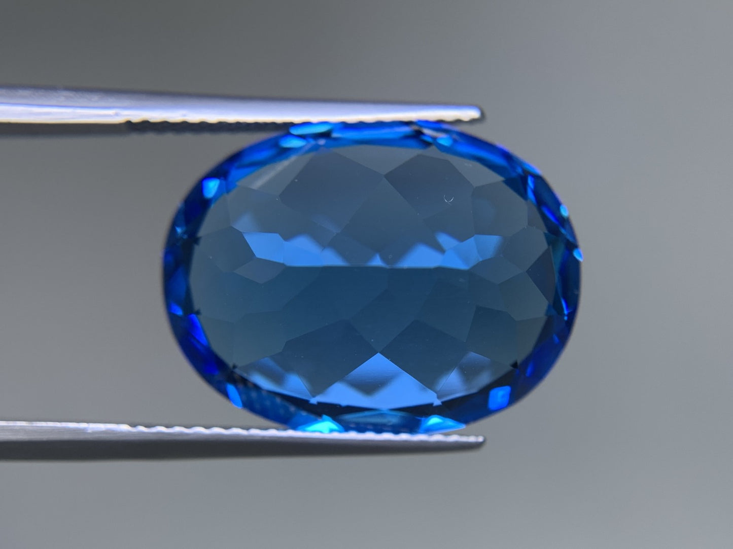 ブルートパーズ 天然 23.222ct 宝石ソーティング付き 20.0㎜×15.2㎜×10.0㎜ ルース（ 裸石 ） 6411Y