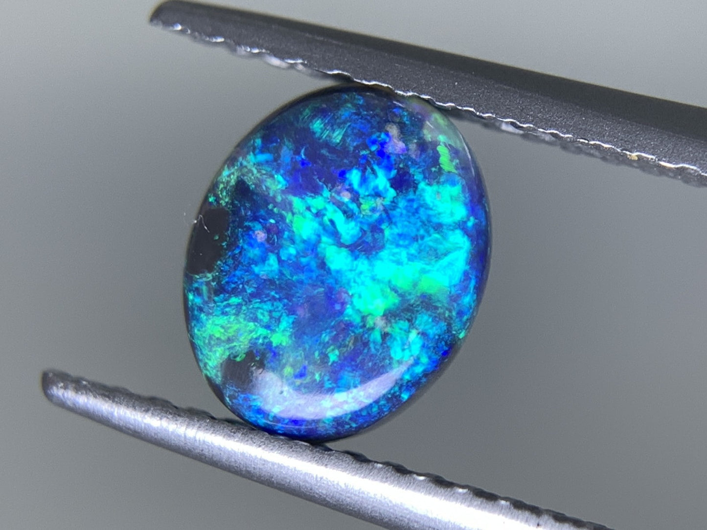 ブラックオパール 天然  0.795ct  宝石ソーティング付き  7.4㎜×6.1㎜×2.4㎜  ルース（ 裸石 ）  5557Y