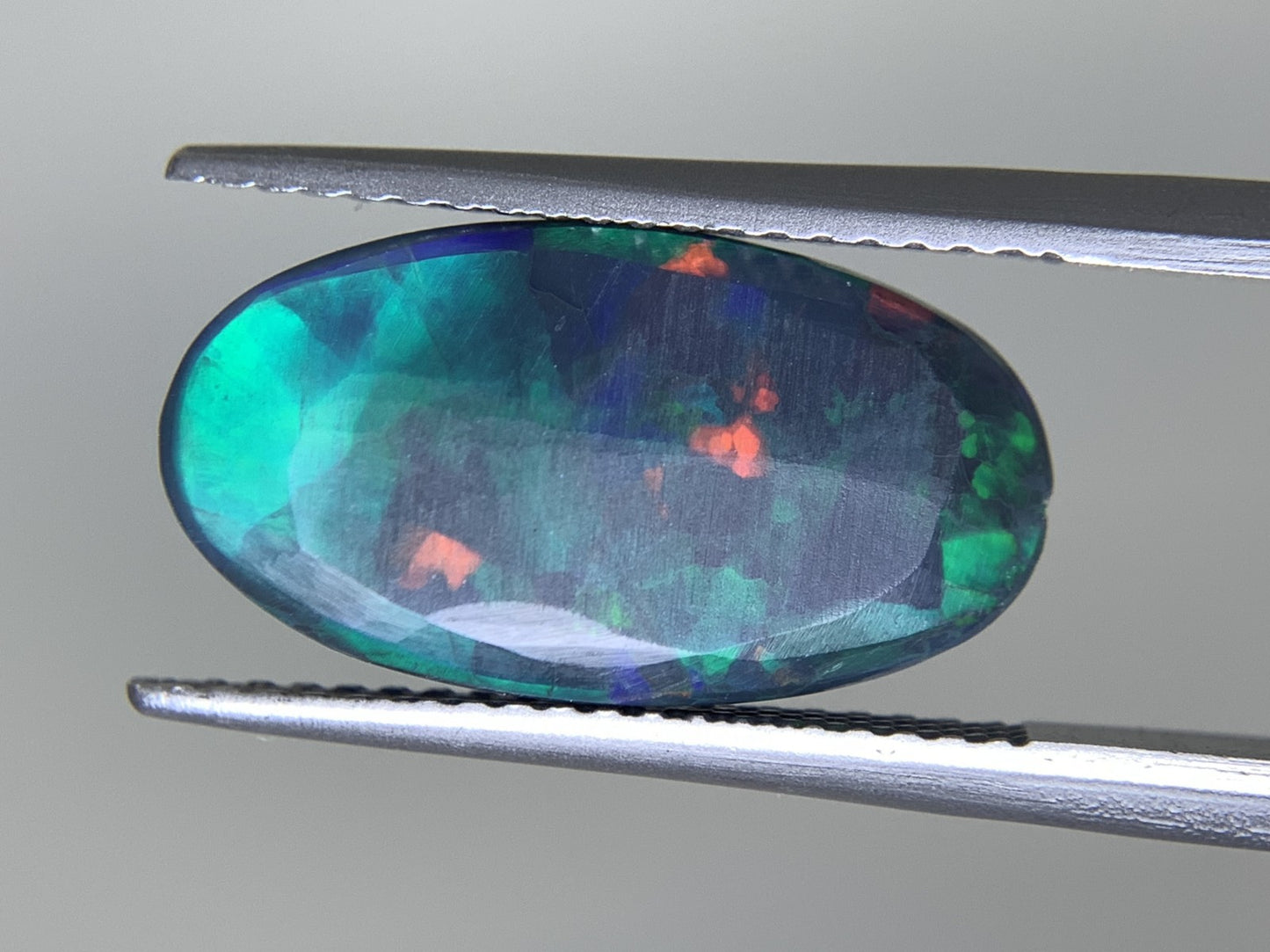 ブラックオパール (両面遊色) 天然  4.102ct  カン有り 中央宝石ソーティング付き  16.7㎜×9.1㎜×4.2㎜   ルース（ 裸石 ） 5566Y
